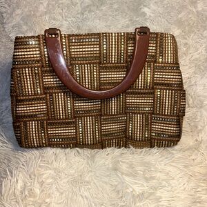 Brown double sided purse with plastic brown handles. NEVER WORN